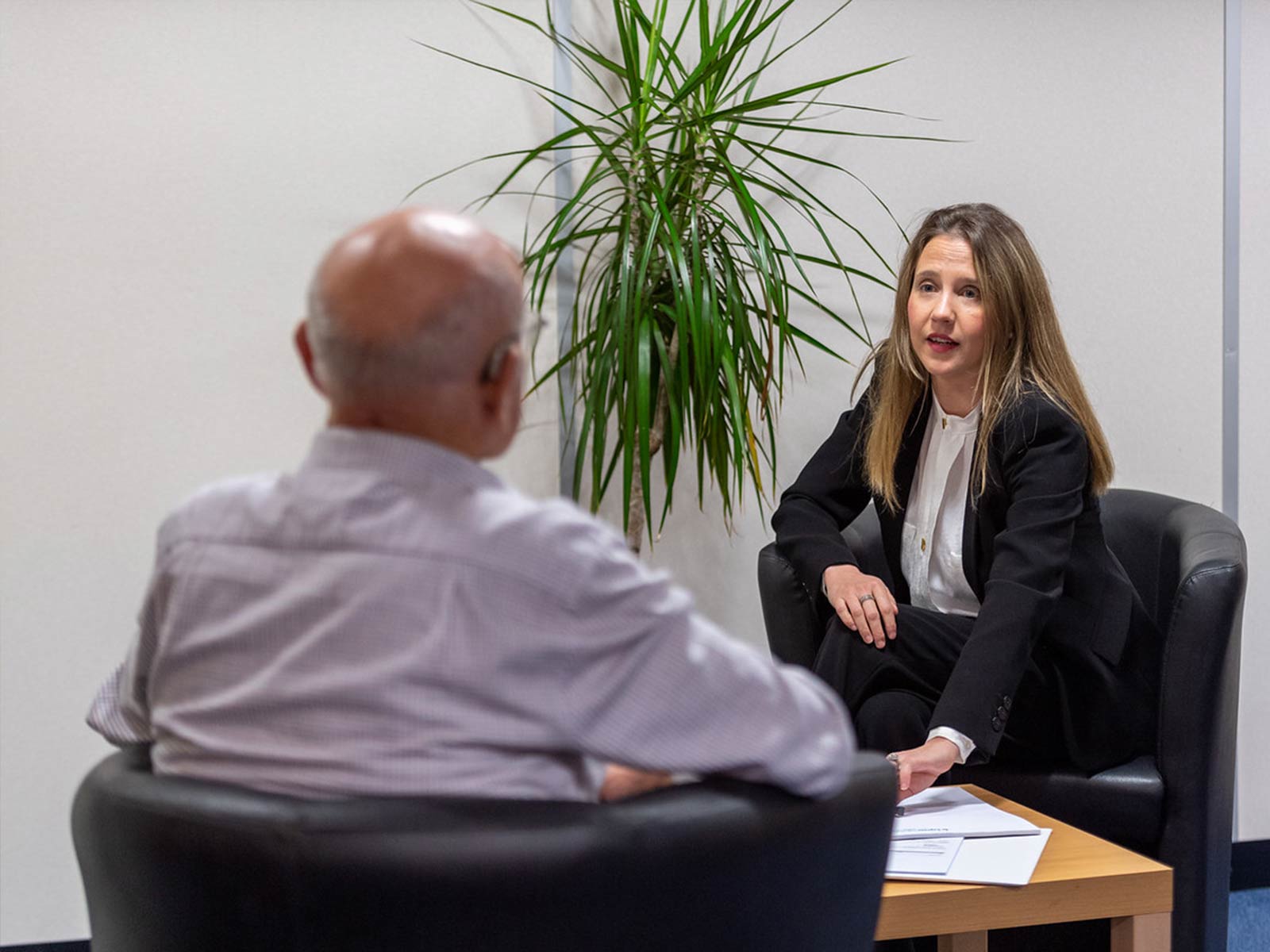 Female solicitor with client