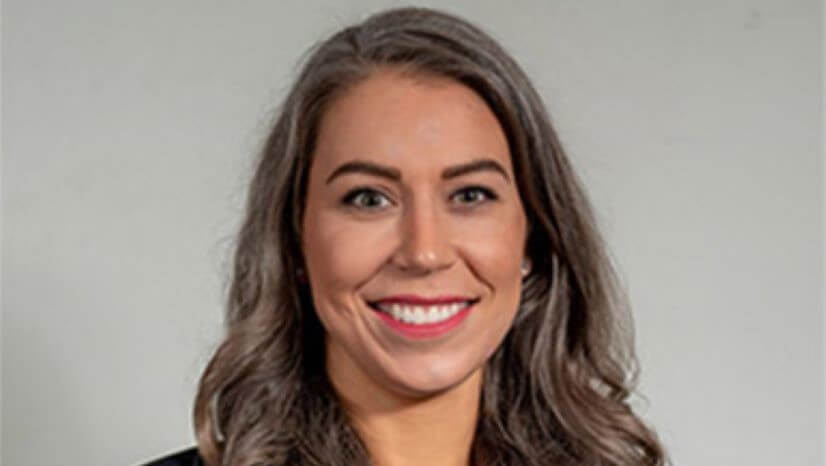 A woman smiling