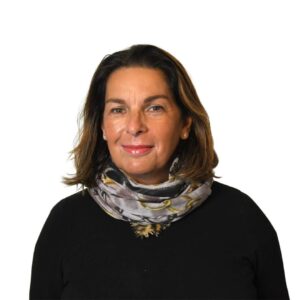 A woman smiling into the camera