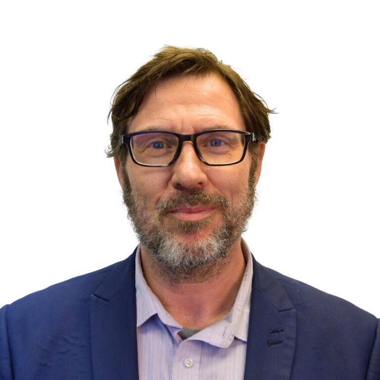 Headshot of man above shoulders